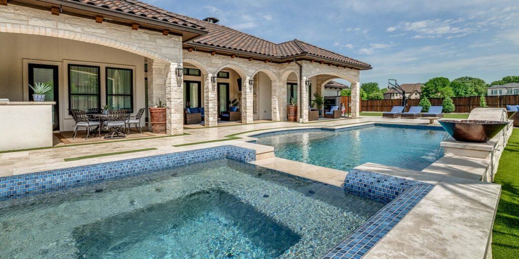 Licensed pool builder inspecting completed custom pool installation in North Texas backyard